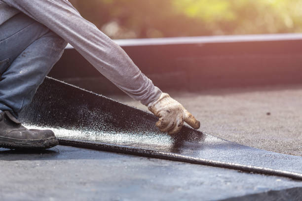 Professional Basement Waterproofing technician working in Sawyer, KS
